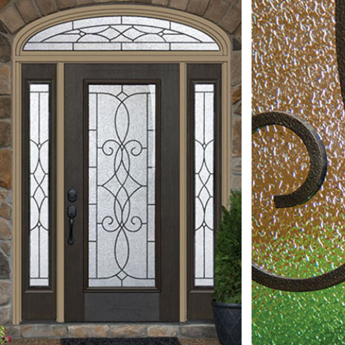 Ornate wooden door with decorative glass panels featuring swirling patterns. The side view shows textured glass detail. Earth-toned stone surrounds the door.